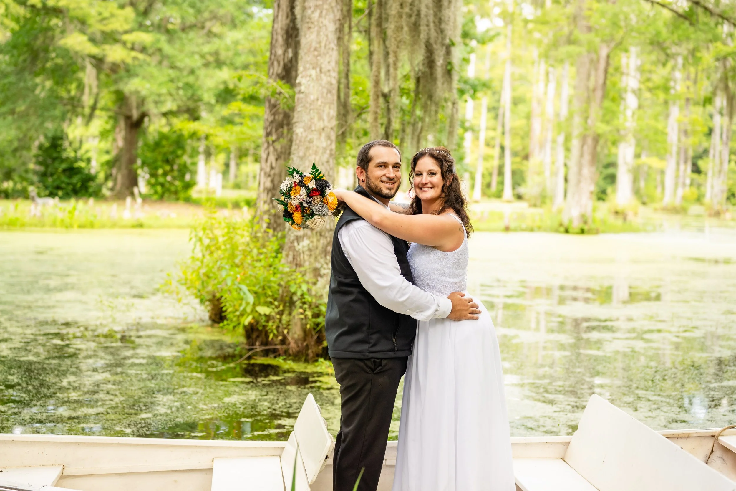 Couple embracing at the edge of the cypress swamp at Cypress Gardens — Charleston, SC
